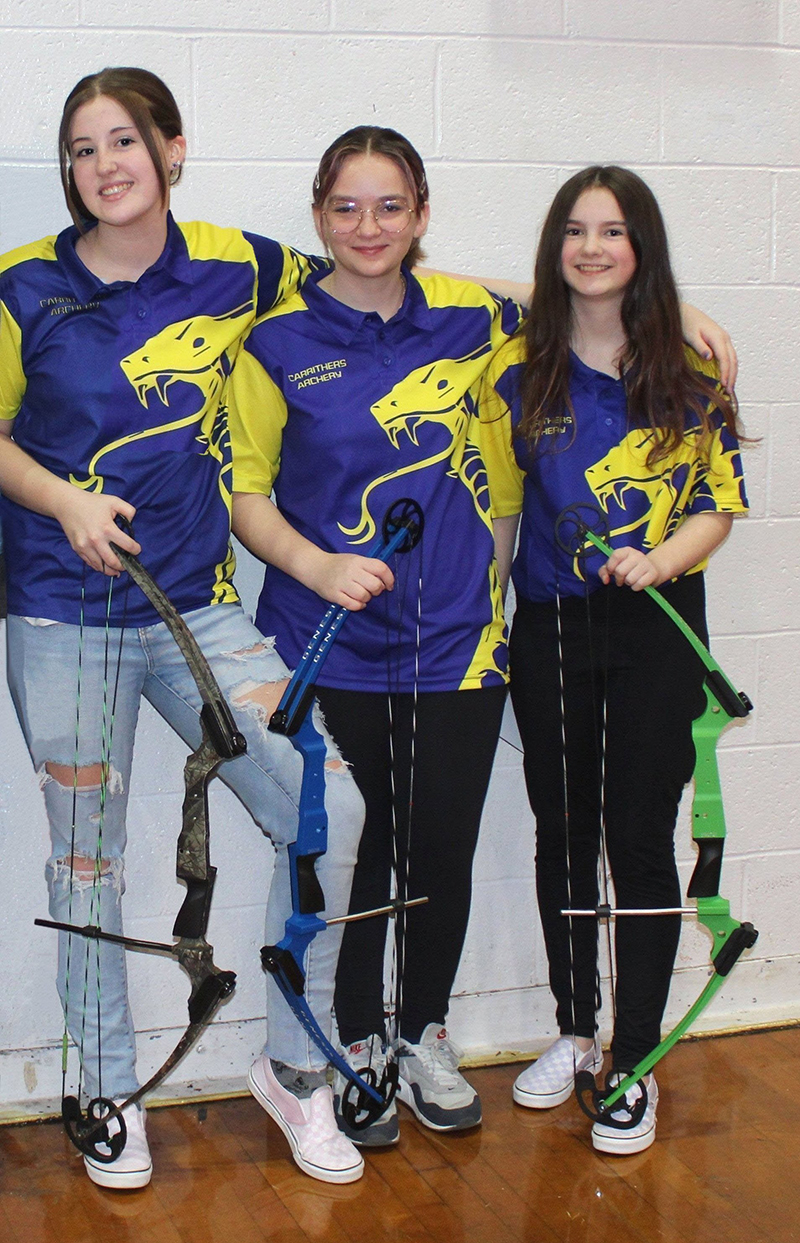 archery students holding bows